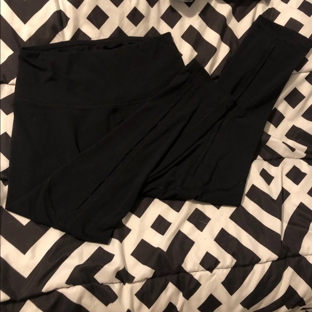 Leggings with decorative slits down calves